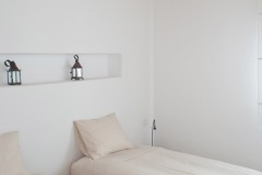 The room with the 2 single bed on the ground floor