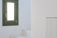 The stairs going to the first floor
